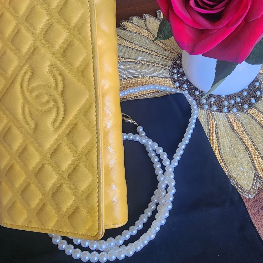 CHANEL Quilted Yellow Wallet on Chain with Pearl Strap